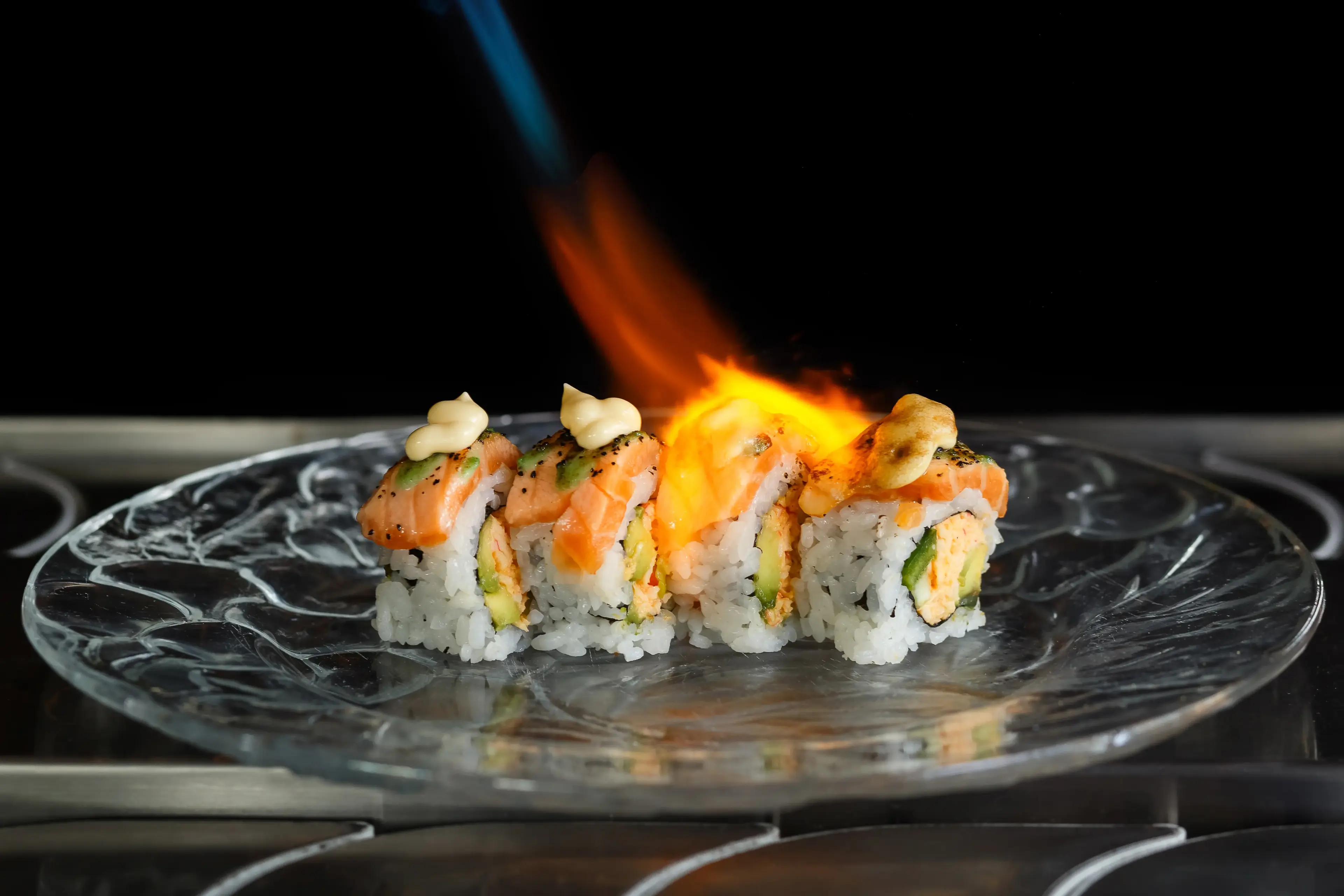 Sushi and plated bites at Zen Sushi & Bar