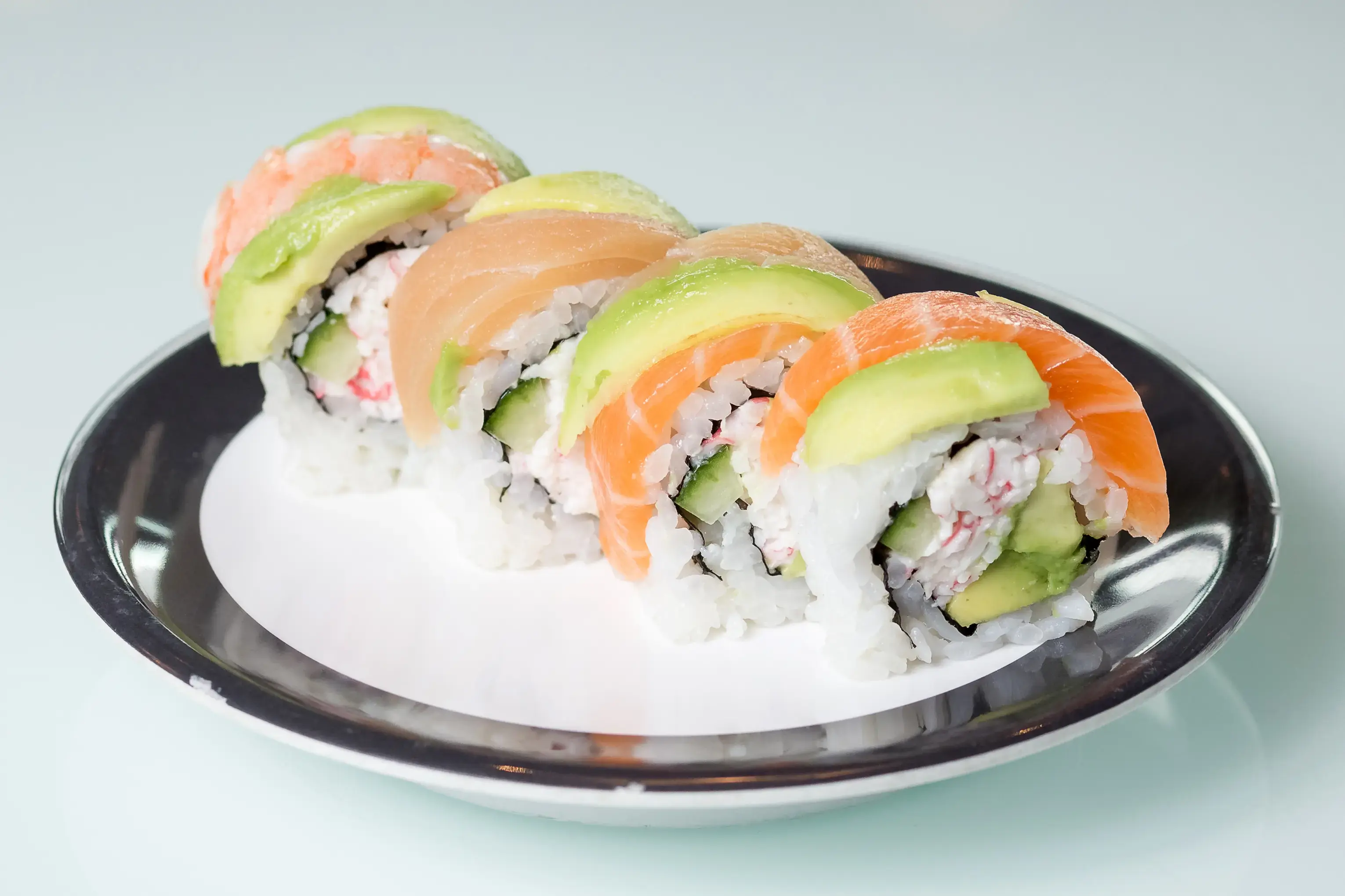 Rainbow roll topped with salmon, tuna and avocado at Zen Sushi & Bar in Bellingham, WA
